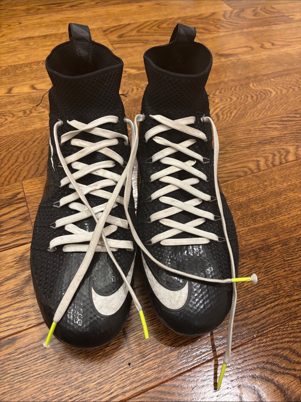 Nike Men’s Black Athletic Cleats with White Swoosh